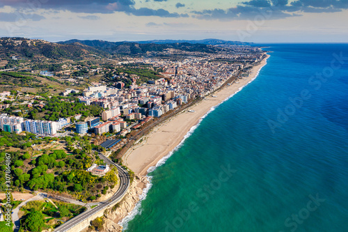 Pineda de Mar. Catalonia, Spain. Aerial view. Resort town, Mediterranean Sea, sunset.