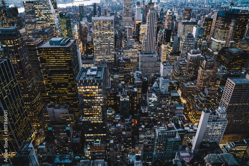 Fotografie Aerial view of skyscrapers and towers in midtown skyline of Manhattan with evening sunset sky
