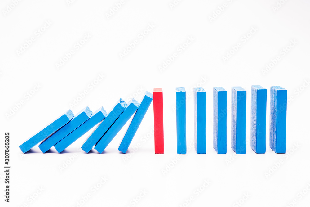 Leadership Concept: Falling bricks which push each other. Red and blue blocks Leadership Concept: Falling bricks which push each other. Red and blue blocks