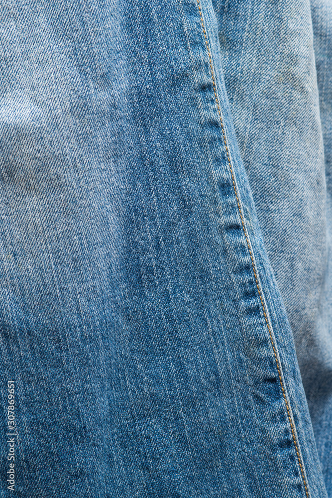 Blue jeans denim fabric texture and background. Blue jeans denim fabric texture and background.