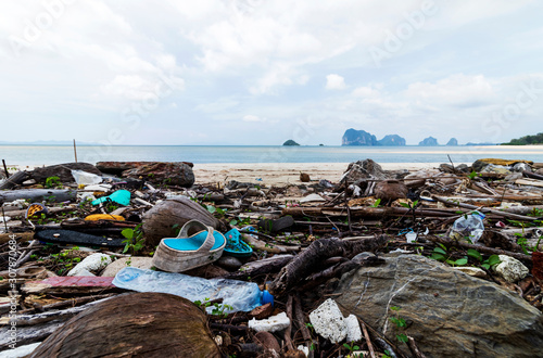 A lot of plastic waste at the seasideil Non-degradable. Ecological problem and environmental pollution.