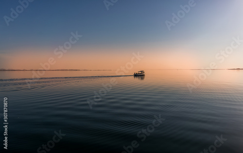 Cuadro en lienzo boat at sunset in nasser lake aswan egypt nile river