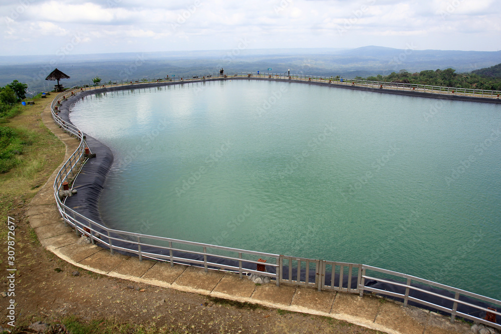 Embung Nglanggeran, lake of catching rainwater at an altitude, Gunungkidul, Yogyakarta. Embung Nglanggeran, lake of catching rainwater at an altitude, Gunungkidul, Yogyakarta.