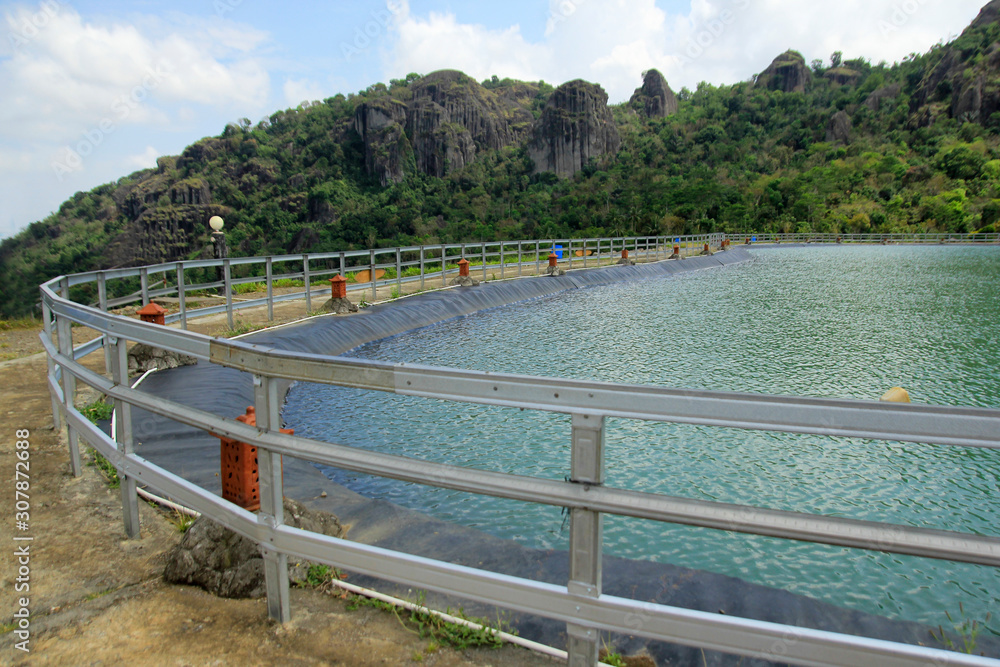 Fototapeta premium Embung Nglanggeran, lake of catching rainwater at an altitude, Gunungkidul, Yogyakarta.