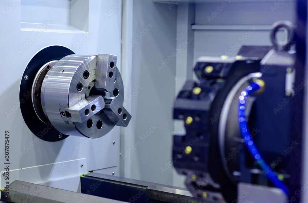 Close-up of CNC machine. CNC Tooling Systems. Close-up of CNC machine. CNC Tooling Systems.