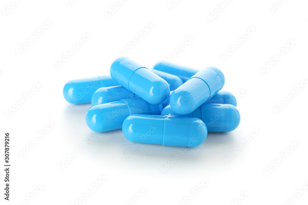 Blue capsules pill isolated on white background, close up Blue capsules pill isolated on white background, close up