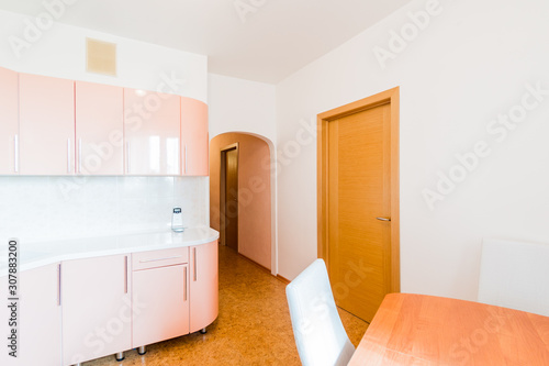 Russia, Omsk- August 02, 2019: interior room apartment. standard repair decoration in hostel. kitchen, dining area