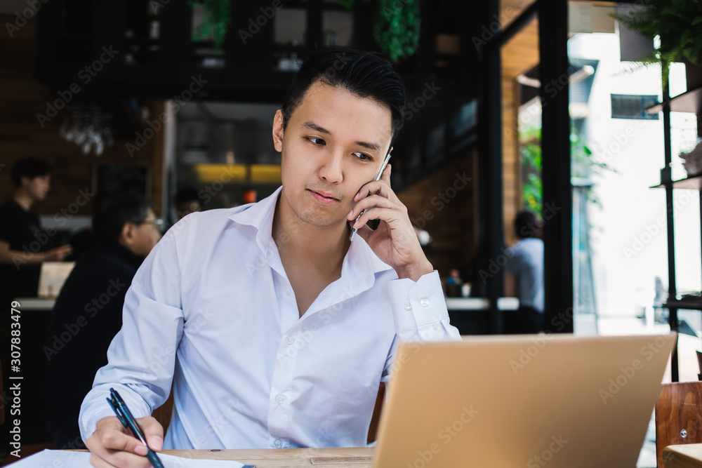 Hardworking freelancer using gadgets in cafe Hardworking freelancer using gadgets in cafe