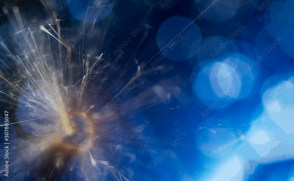Bengal fire -sparcler on a blue background. Element of decorations for celebrations and holidays. Bengal fire -sparcler on a blue background. Element of decorations for celebrations and holidays.