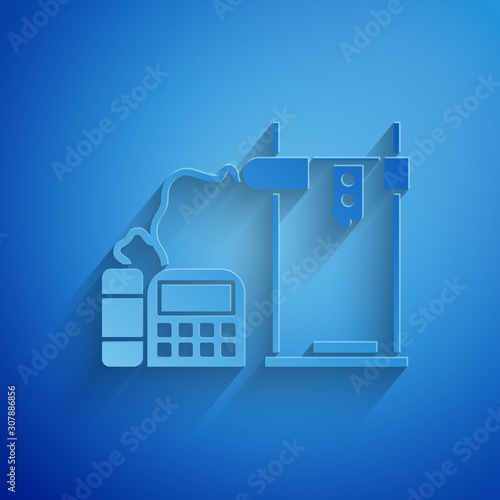 Paper cut 3D printer icon isolated on blue background. Paper art style. Vector Illustration