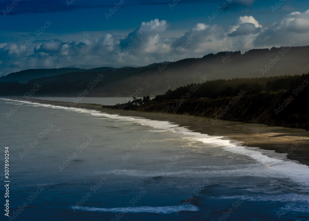 Agate Beach in Triidad, view from above, on a rainy afternoon featuring clouds and fog