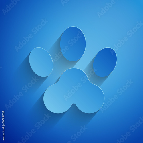Paper cut Paw print icon isolated on blue background. Dog or cat paw print. Animal track. Paper art style. Vector Illustration