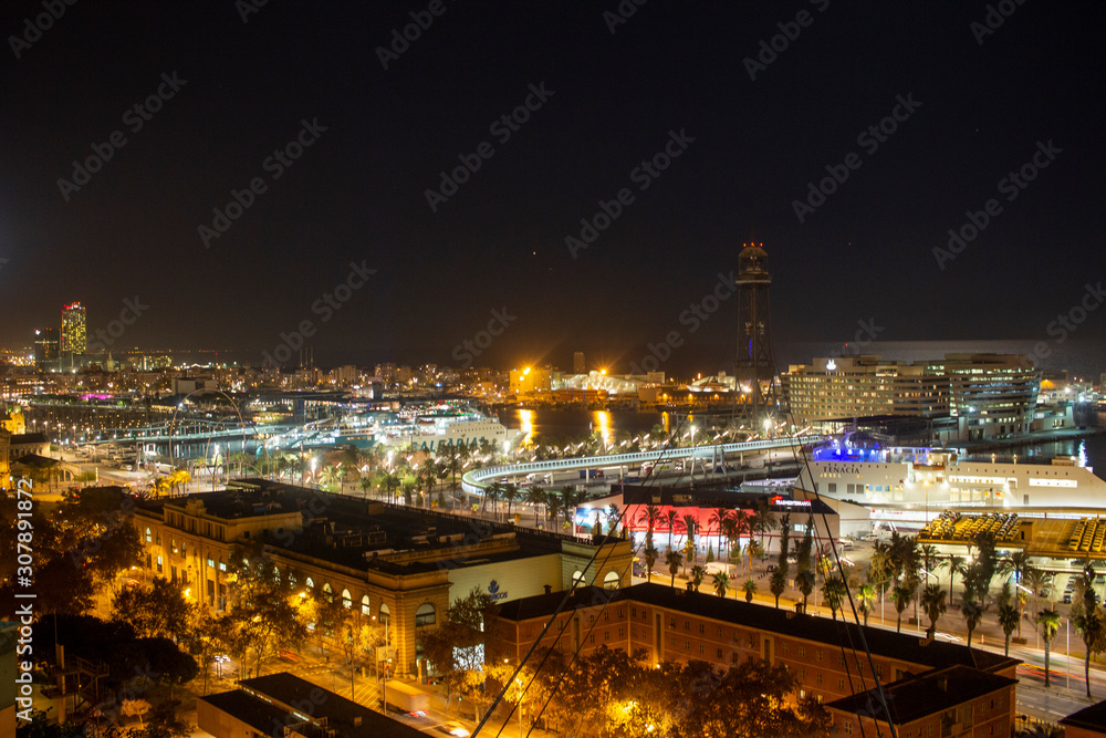 The lights of the port of Barcelona at night