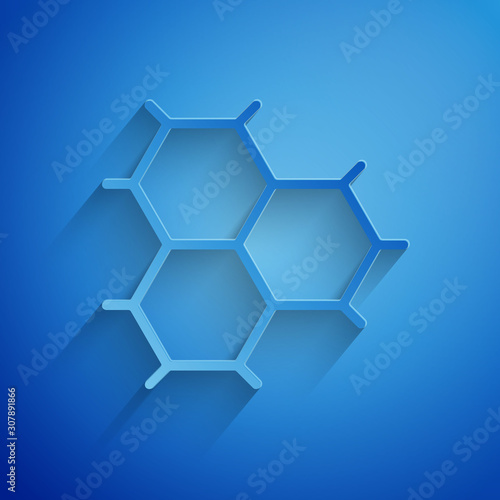 Fotografie Paper cut Chemical formula consisting of benzene rings icon isolated on blue background