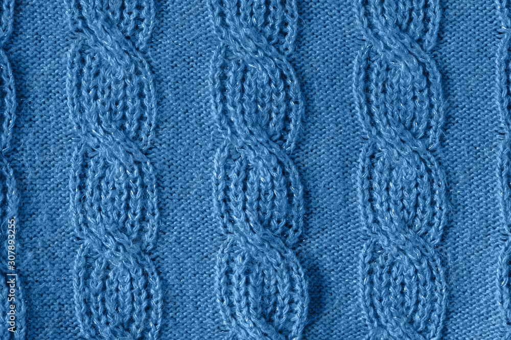 Blue knitted wool texture can use as background.Blue trend color