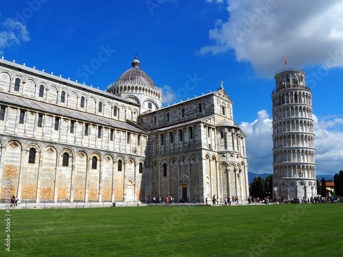 View of the Pisa Cathedral (Duomo di Pisa) and the Leaning Tower of Pisa (Torre pendente di Pisa) in Pisa, Italy. They are located in Miracoli Square (Piazza dei Miracoli).