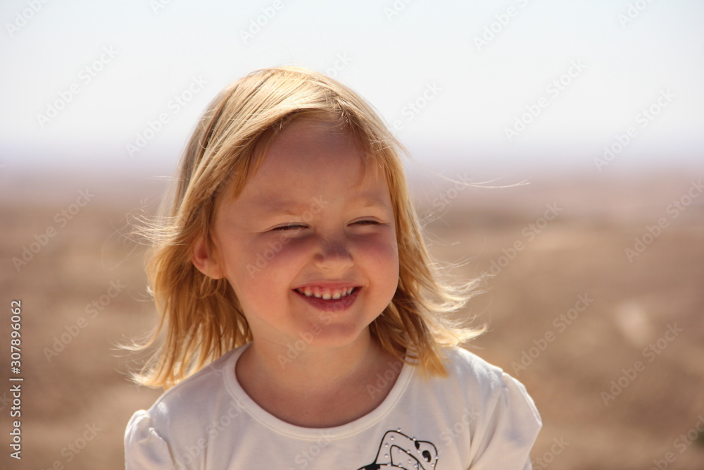 portrait of a girl who laughs