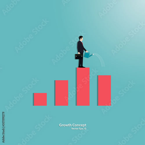 Businessman watering small graph growing