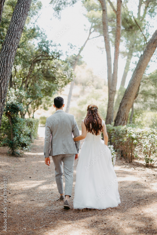 bride and groom walking together