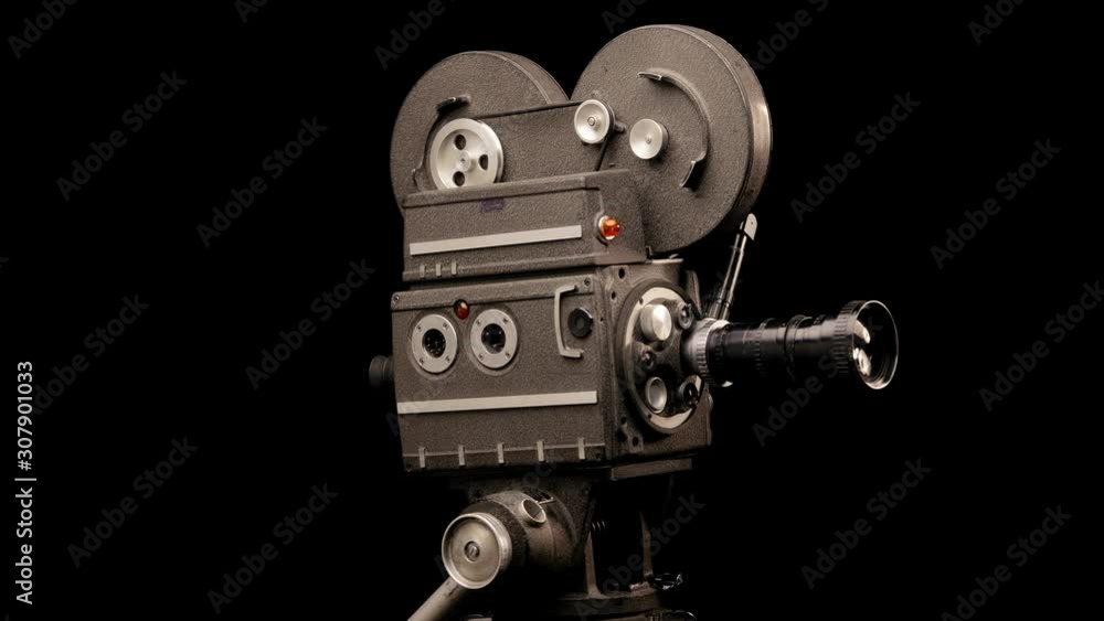 Movie Camera in Front of Black Backdrop. Movie Camera in Front of Black Backdrop.