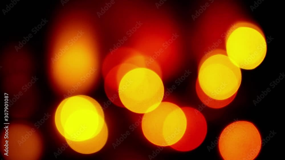 Abstract Blurred Bokeh Holiday Background. Blinking Garland. Colorful Big Bokeh Background. Christmas and New Year Decoration. Abstract Blurred Bokeh Holiday Background. Blinking Garland. Colorful Big Bokeh Background. Christmas and New Year Decoration.