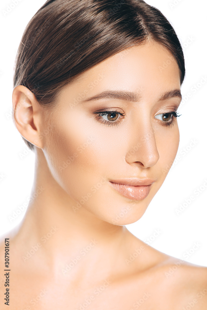 Portrait of young beautiful woman isolated on white. Natural beauty face with lift skin
