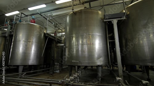 Modern equipment on ice cream factory. Cooling system in the interior of a modern factory, production line, dairy products. photo