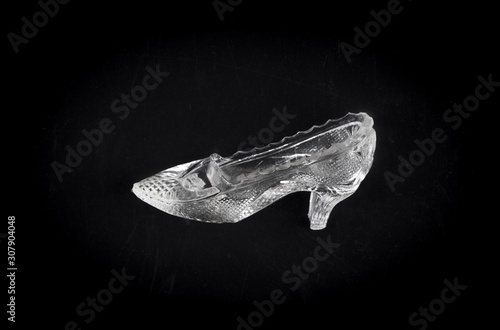 crystal fairy slipper isolated on black background photo