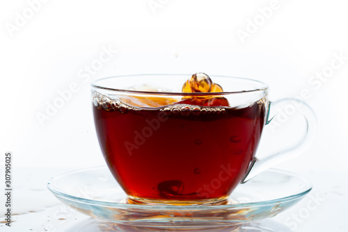 Cup of tea on white background