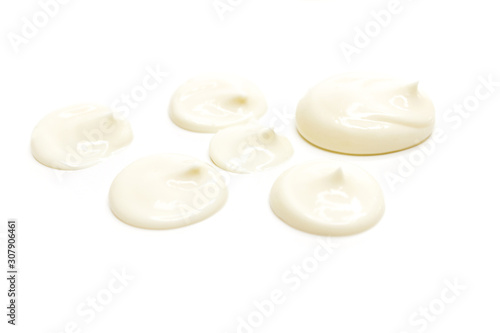 Handful of mayonnaise isolated on white closeup