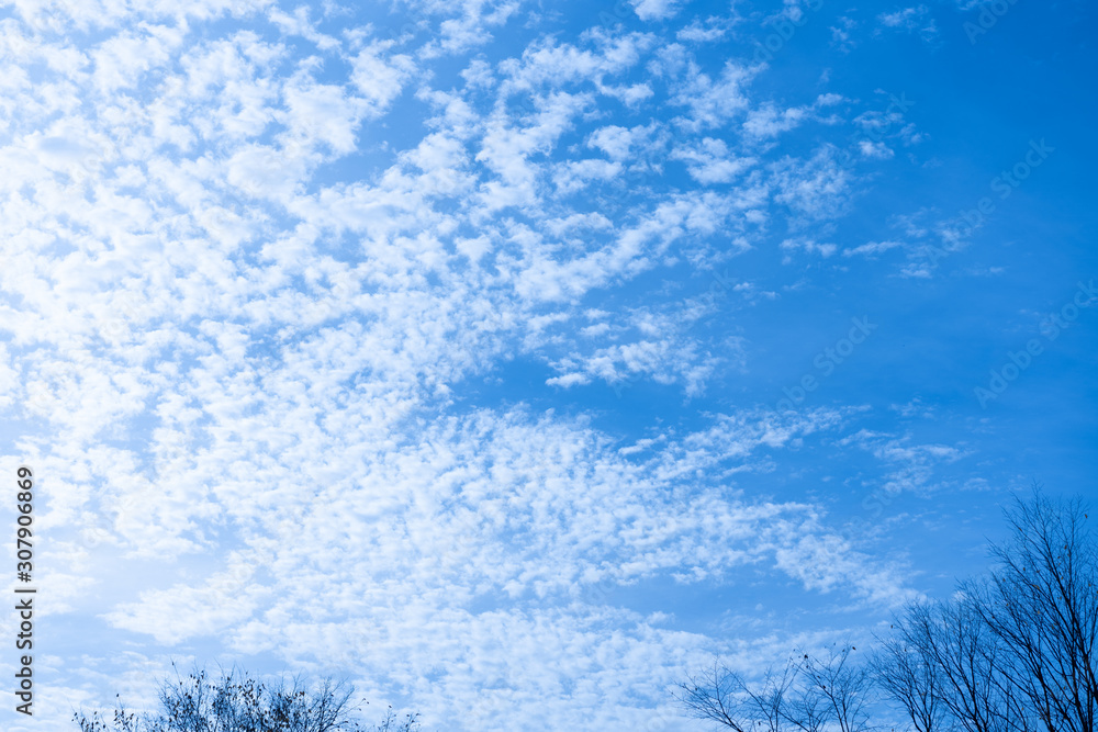 Blue sky with lots of clouds and sun Blue sky with lots of clouds and sun