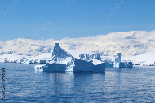 Mountains and icebergs among the islands around the Antarctic Peninsula, Antarctica