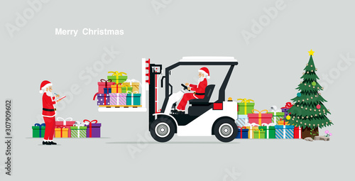Santa Claus carrying gifts by using a forklift.