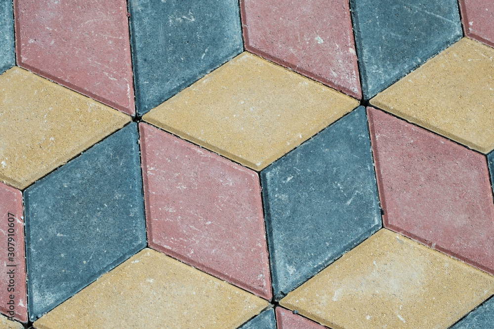 abstract paving tiles in the form of cubes of tiles of different colors abstract paving tiles in the form of cubes of tiles of different colors
