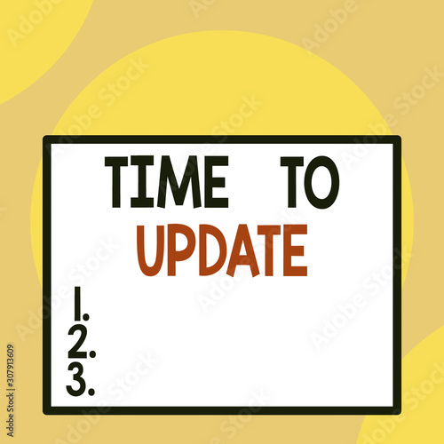 Writing note showing Time To Update. Business concept for The latest information about a particular situation Front close up view big blank rectangle abstract geometrical background photo
