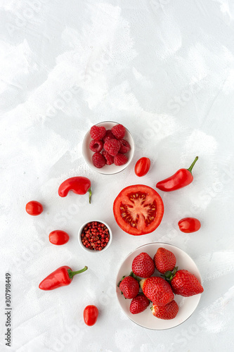 Assortment of red fruits and vegetables from above