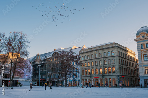 Riga / Latvia - 03 December 2019:Livu square with medieval buildings in the old town of Riga, Latvia. photo