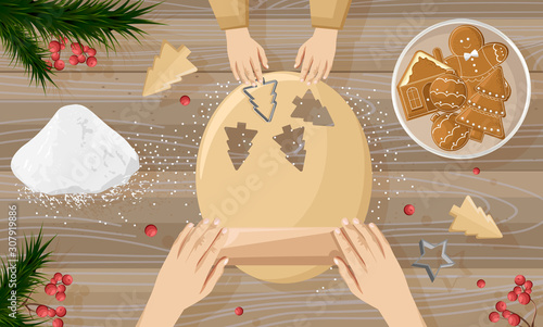 Mother cooking with her children gingerbread cookies. Making forms on dough. ...