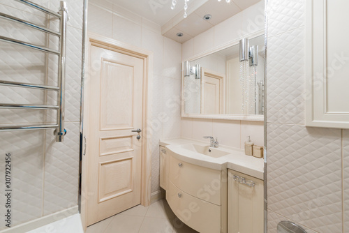 Russia, Omsk- August 02, 2019: interior room apartment. standard repair decoration in hostel. bathroom, sink, decoration elements, toilet