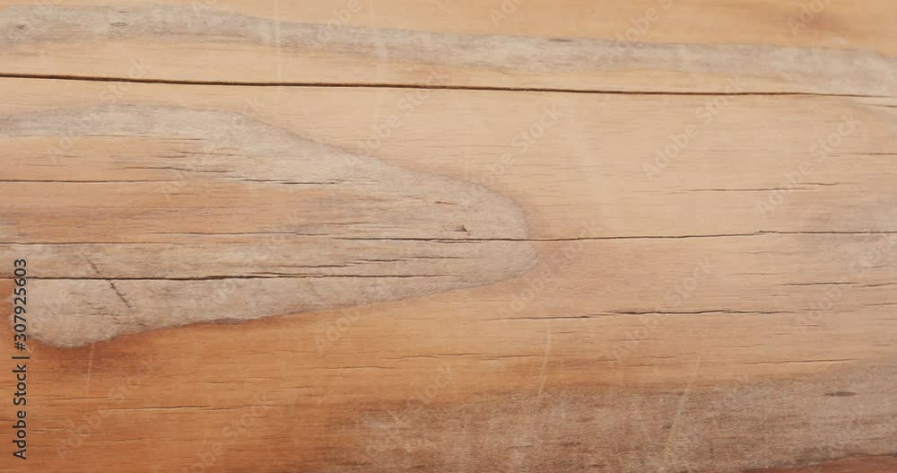 Macro shot of a precious wood, wood grain, knots and high quality workmanship Macro shot of a precious wood, wood grain, knots and high quality workmanship