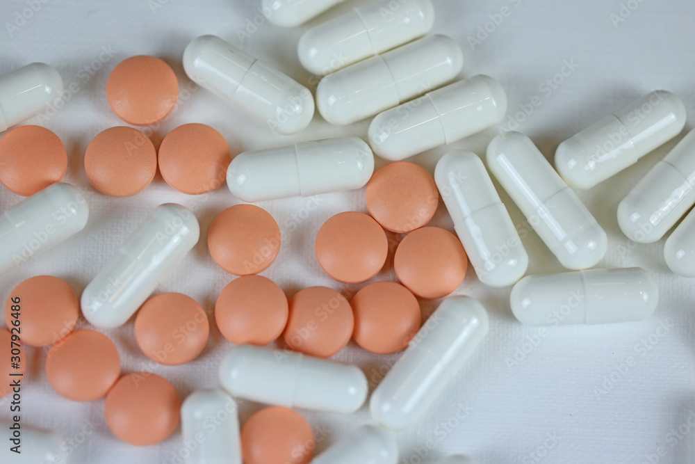 pills, vitamins or dietary supplements on a white background pills, vitamins or dietary supplements on a white background