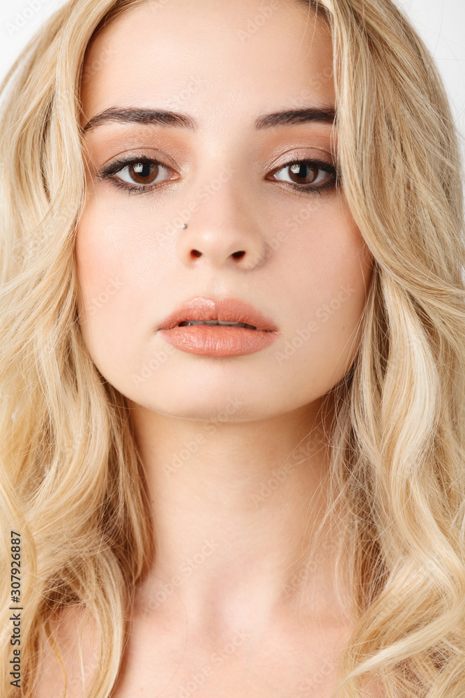close up face of young woman with clean fresh skin of blond hair close up face of young woman with clean fresh skin of blond hair