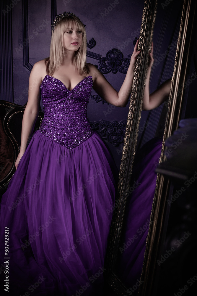 Magical night, blonde hair woman in purple evening chiffon dress