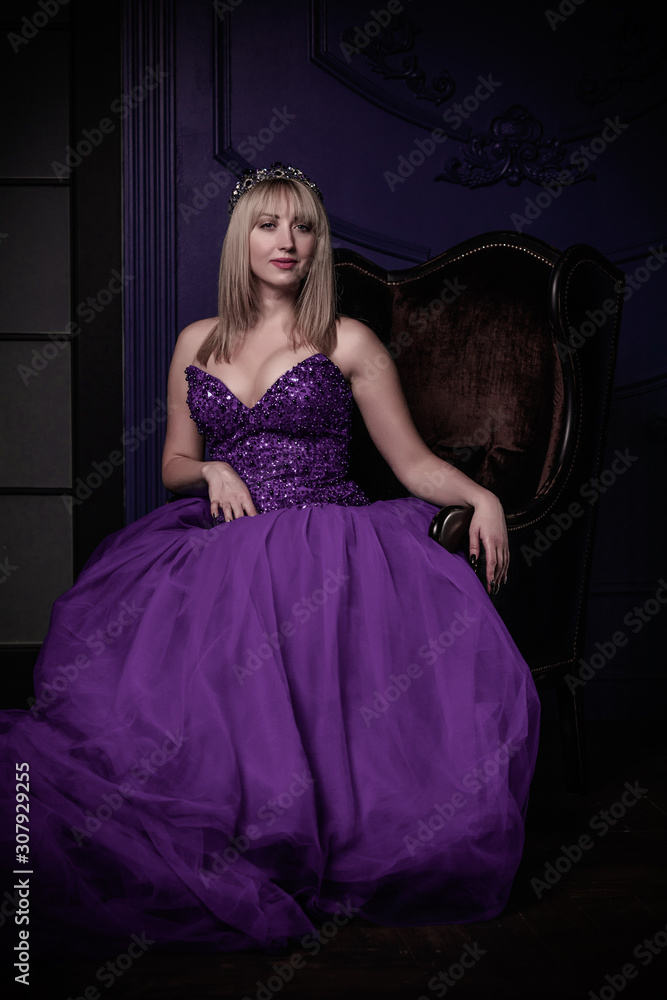 Magical night, blonde hair woman in purple evening chiffon dress Magical night, blonde hair woman in purple evening chiffon dress