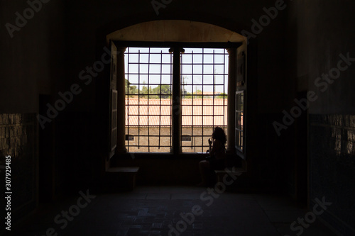 girl sitting by the window