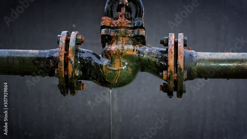 Water leaking from old rusty water supply pipe