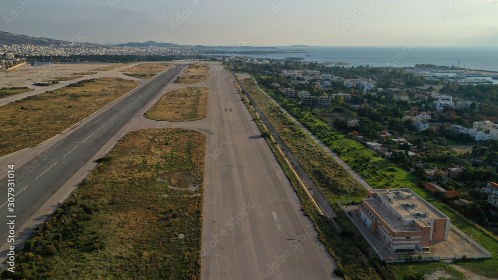 Aerial drone photo of abandoned runway in former international airport of Greece in Elliniko area, South Athens riviera, Attica, Greece