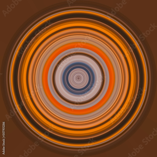 Colorful abstract bright circle , circular lines , radial striped texture in orange tones on brown background. Round pattern
