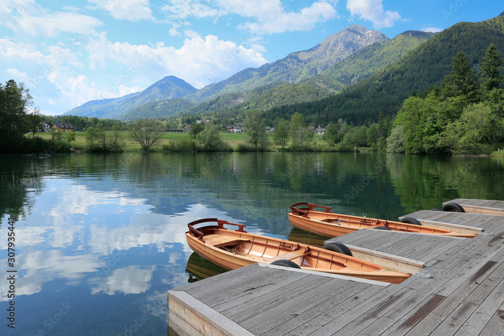 Breathtaking view of lake Crnava and Karavanke mountains in Preddvor, Slovenia