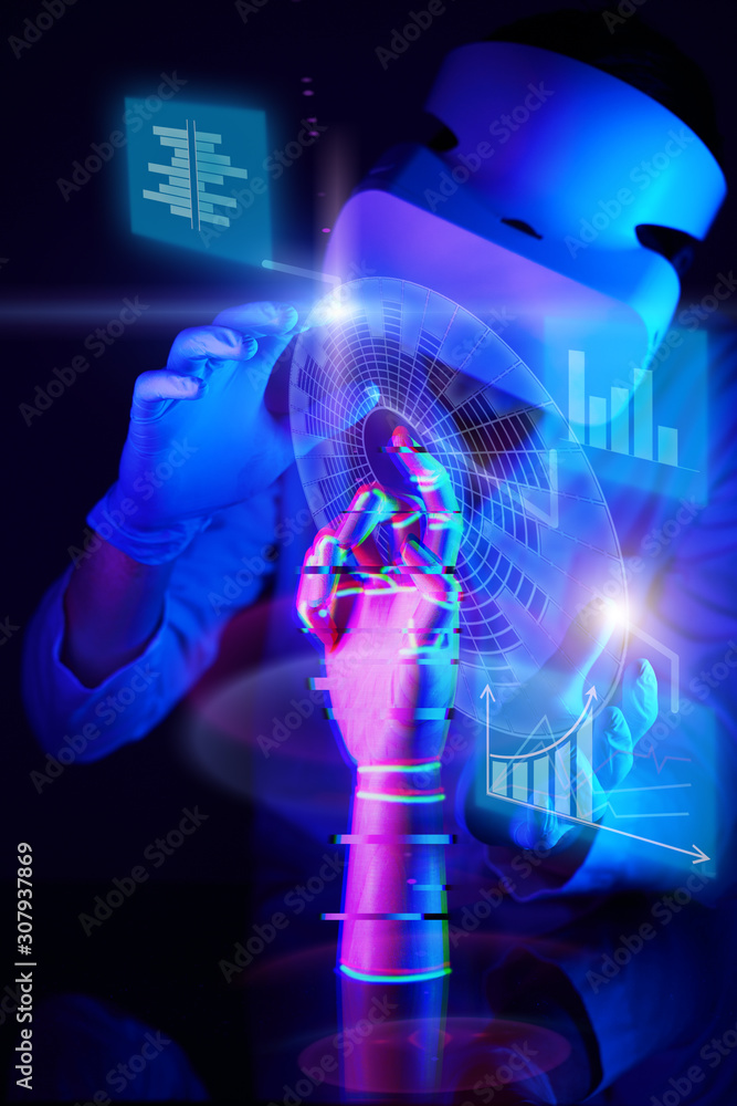 Fototapeta premium Engineer creates a robotic arm. Concept of cyber communication and robotic.